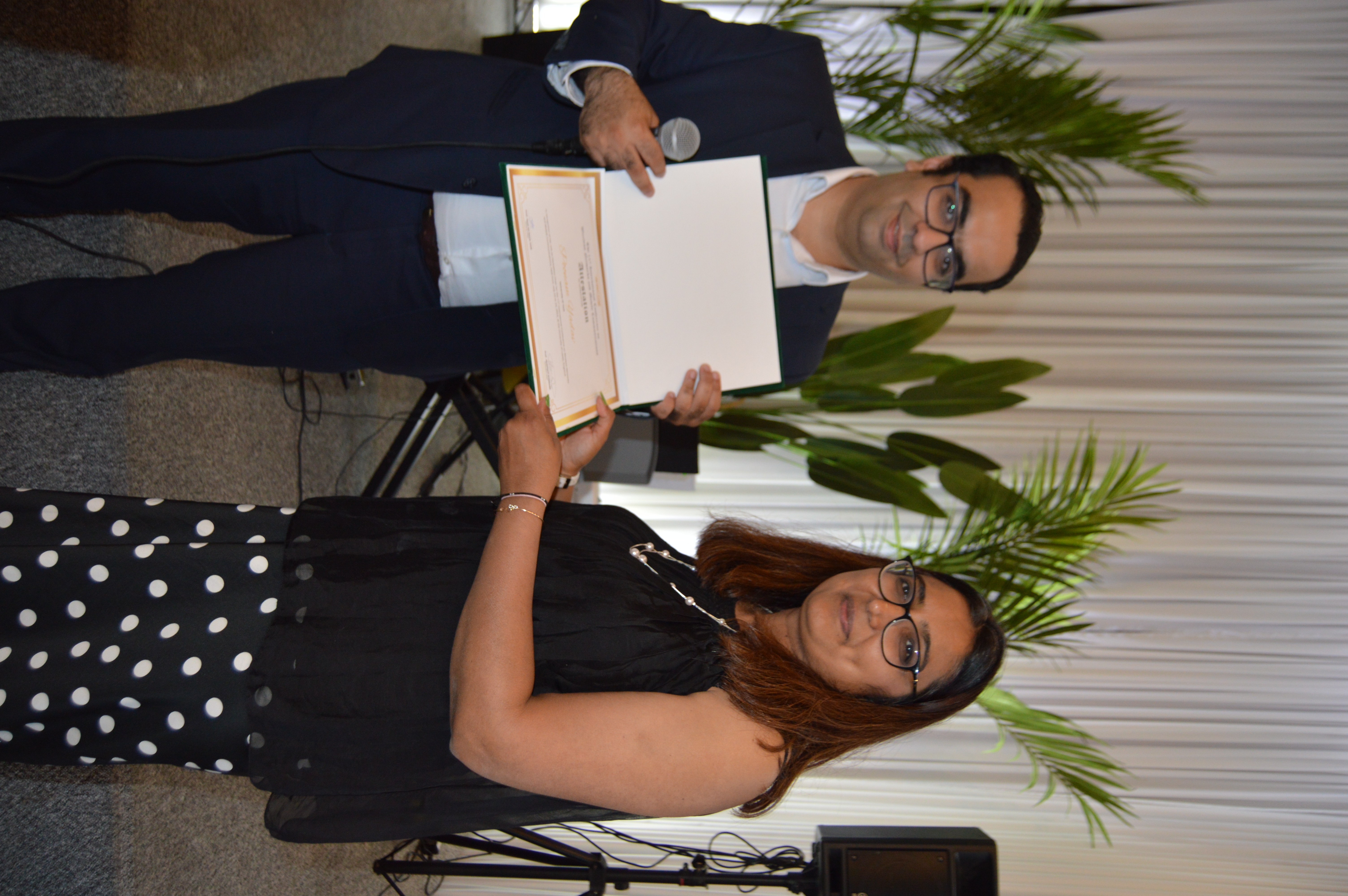 Poonam Yadav receiving an award